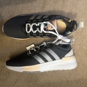 ADIDAS Woman’s Size 9.5 NWT. Runs big.